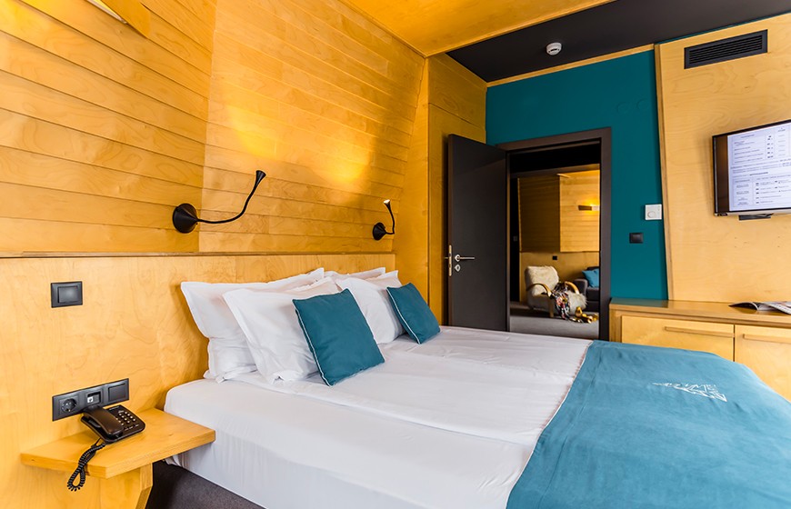 Photo of a bedroom from One bedroom Deluxe Apartment